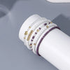 Five-Piece Beaded Elastic Bracelet Set with Decorative Charms - Image 6