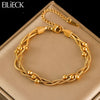 Woven Link Stainless Steel Bracelet with Gold Tone Finish - Image 1