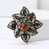 Rhinestone Flower Brooch Pin with Pearl and Leaf Designs - Image 7