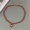 Evil Eye Charm Necklace with Colorful Beads in a Choker Style - Image 11