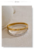 Interlocking Loop Bracelet with Cubic Zirconia Accents in Gold Tone or Silver Tone - Image 18