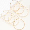 Seven Piece Heart Print Open Bangle Set in Gold Tone - Image 10