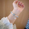 Blue Stone Bead Bracelet with Oval Pendant and Adjustable Fit - Image 3