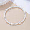 A-Z Initial Letter Bracelet for Women White Beads Round Pendant Elastic Bracelets Jewelry Mother of Pearl Charm - Image 21