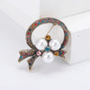 Rhinestone Flower Brooch Pin with Pearl and Leaf Designs - Image 11