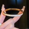 Open Stainless Steel Bangle with Decorative Stone Details in Multiple Styles - Image 9