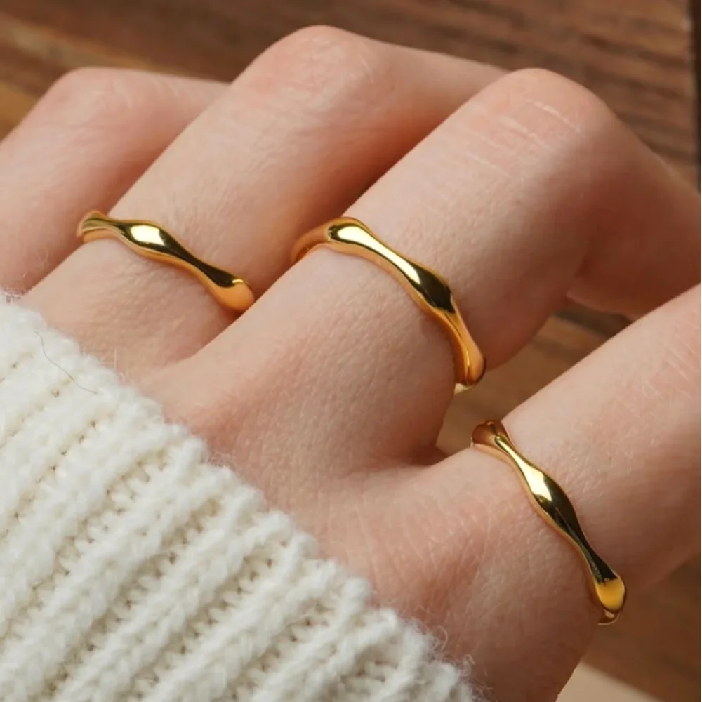 Ripple Stainless Steel Band Rings in Gold Tone and Silver Tone - Image 1