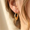 Geometric Twisted Hoop Earrings in Gold-Tone or Silver-Tone - Image 4