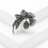 Rhinestone Flower Brooch Pin with Pearl and Leaf Designs - Image 21