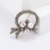 Rhinestone Flower Brooch Pin with Pearl and Leaf Designs - Image 14