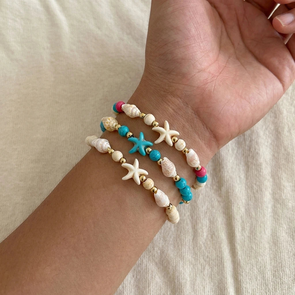 Shell and Starfish Charm Bracelet with Adjustable Rope Detail - Image 1