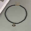 Evil Eye Charm Necklace with Colorful Beads in a Choker Style - Image 4