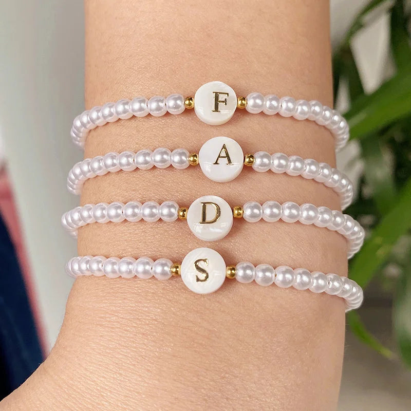A-Z Initial Letter Bracelet for Women White Beads Round Pendant Elastic Bracelets Jewelry Mother of Pearl Charm - Image 1