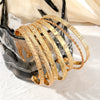 Seven-Piece Metal Bangle Set with Heart Motifs in Gold-Tone or Silver-Tone - Image 4