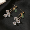 Sweet Temperament Small Fresh Bamboo White Lily Of The Valley Flower Earrings Elegant And Gentle Asymmetric Earrings - Image 9