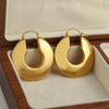 U-Shaped Chunky Hoop Earrings with Geometric Profile - Image 15