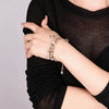 Heart-Shaped Bracelet with Bow Detail in Gold-Tone - Image 4