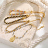 Two-Tone Stainless Steel Link Bracelet with Mixed Chain Design - Image 4