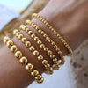 Stainless Steel Gold Plated Elastic Beaded Bracelet Stackable Design Unisex For Daily Commute And Party Wear - Image 1