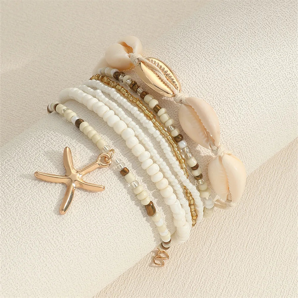 7 Pcs Stackable Starfish Pendant Bracelet Set with Mini Seed Beads Handcrafted Beach Jewelry for Women - Image 1