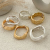 Wide Wave Cuff Bangle in Matte Gold-Tone and Silver-Tone Alloy - Image 19