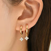 Flower Pendant Huggie Hoop Earrings in Stainless Steel with Gold-Tone or Silver-Tone Options - Image 1