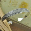 Antique Silver-Tone Open Cuff Bracelet with Snake and Floral Motifs - Image 7