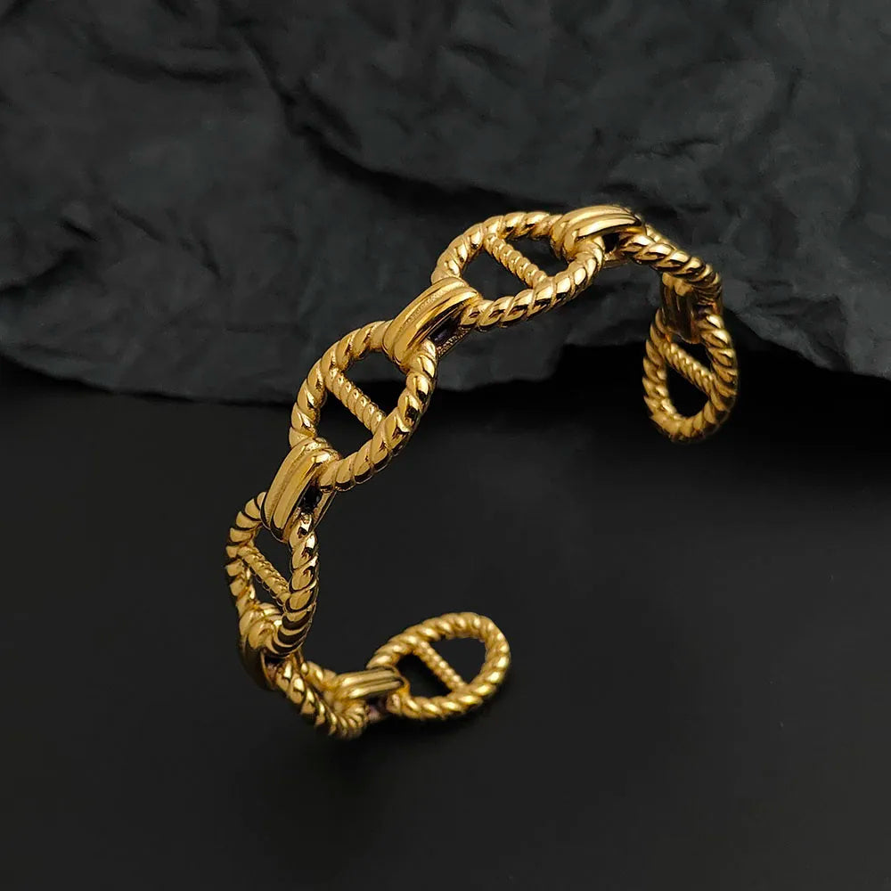 Integrated Pattern Stainless Steel Bracelet in Gold Tone and Silver Tone - Image 1