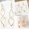 Spiral Women's Hook Earrings Hollow Twist Geometric Statement Long Hanging Earrings Wraped Oval Metal Pendants Earrings - Image 1