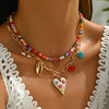 Bohemian Multilayer Beaded Necklace with Heart Charm - Image 1