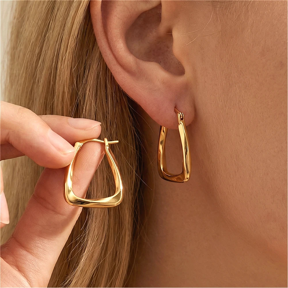 Geometric Twisted Hoop Earrings in Gold-Tone or Silver-Tone - Image 1