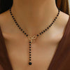Imitation Pearl Tassel Y Necklace with Bow in Black or White - Image 6