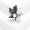 Rhinestone Flower Brooch Pin with Pearl and Leaf Designs - Image 22