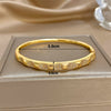 316L Stainless Steel Bangle Bracelet with Cubic Zirconia Details in Gold-Tone - Image 26