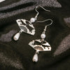 Chinese Retro National Fan-shaped Tassel Earrings Female National Style Hollow Cloud Fan Hanging Dangle Earrings Jewelry - Image 1