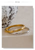 Interlocking Loop Bracelet with Cubic Zirconia Accents in Gold Tone or Silver Tone - Image 17