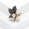 Rhinestone Flower Brooch Pin with Pearl and Leaf Designs - Image 19