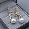 Elegant Micro Inlaid Rhinestone Bowknot Pearl Dangle Earring for Women French Style Niche Temperament Advanced Design Jewelry - Image 1