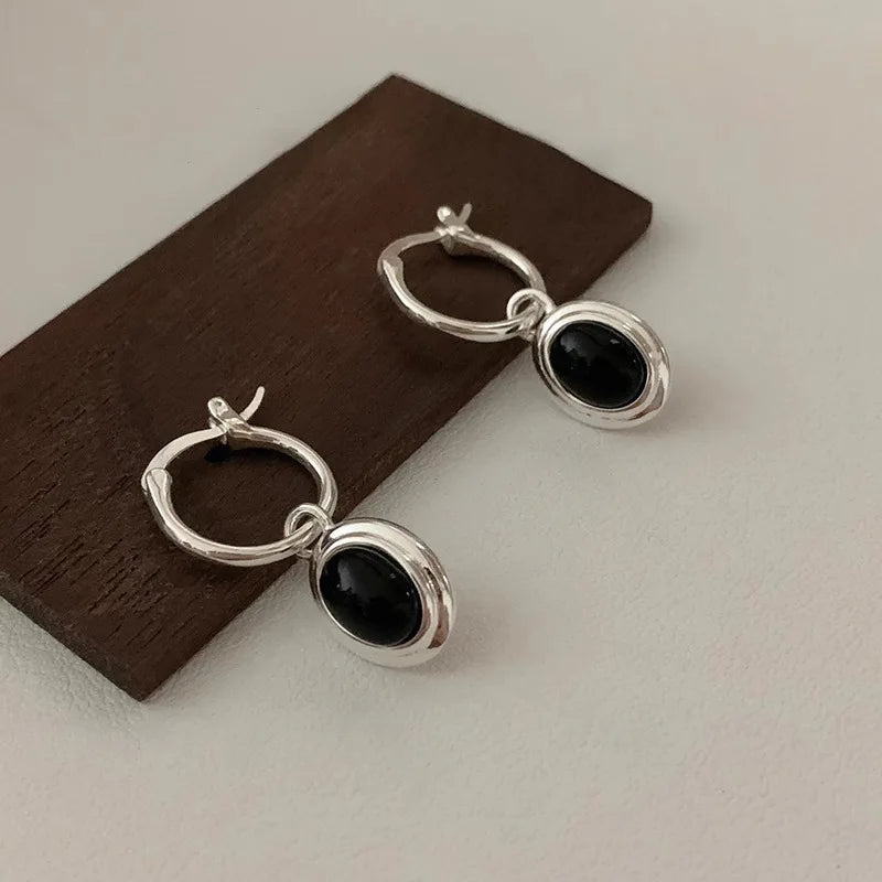 Black Ball Stud Earrings with Gold-Tone or Silver-Tone Settings - Image 1