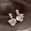 High Class Imitation Shell White Flower Petal Pendant Earrings For Women‘s Design Jewelry Accessories in - Image 1