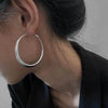 Irregular Twisted Hoop Earrings with Sculptural Metal Profile - Image 8