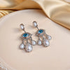 French Vintage Exaggerated Devil's Eye Pearl Tassel Earrings For Women Retro Big Eye Pendant Earrings Casual Jewelry - Image 4