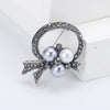 Rhinestone Flower Brooch Pin with Pearl and Leaf Designs - Image 17