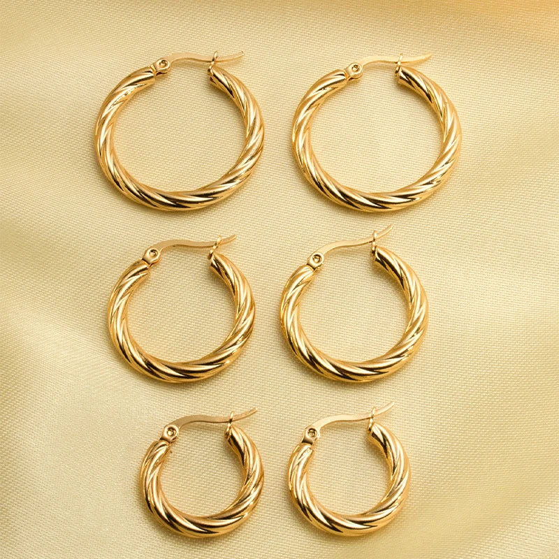 Twisted Hoop Earrings in Gold-Tone or Silver-Tone - Image 1
