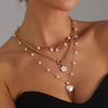 Layered Imitation Pearl Necklace with Metal Tassel Details - Image 7
