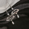 Chinese Retro National Fan-shaped Tassel Earrings Female National Style Hollow Cloud Fan Hanging Dangle Earrings Jewelry - Image 3