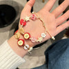 Lovely Apples Charm Bracelet for Girls with Brown Cord Fun and Stylish Accessory for Women Ladies Jewelry - Image 1