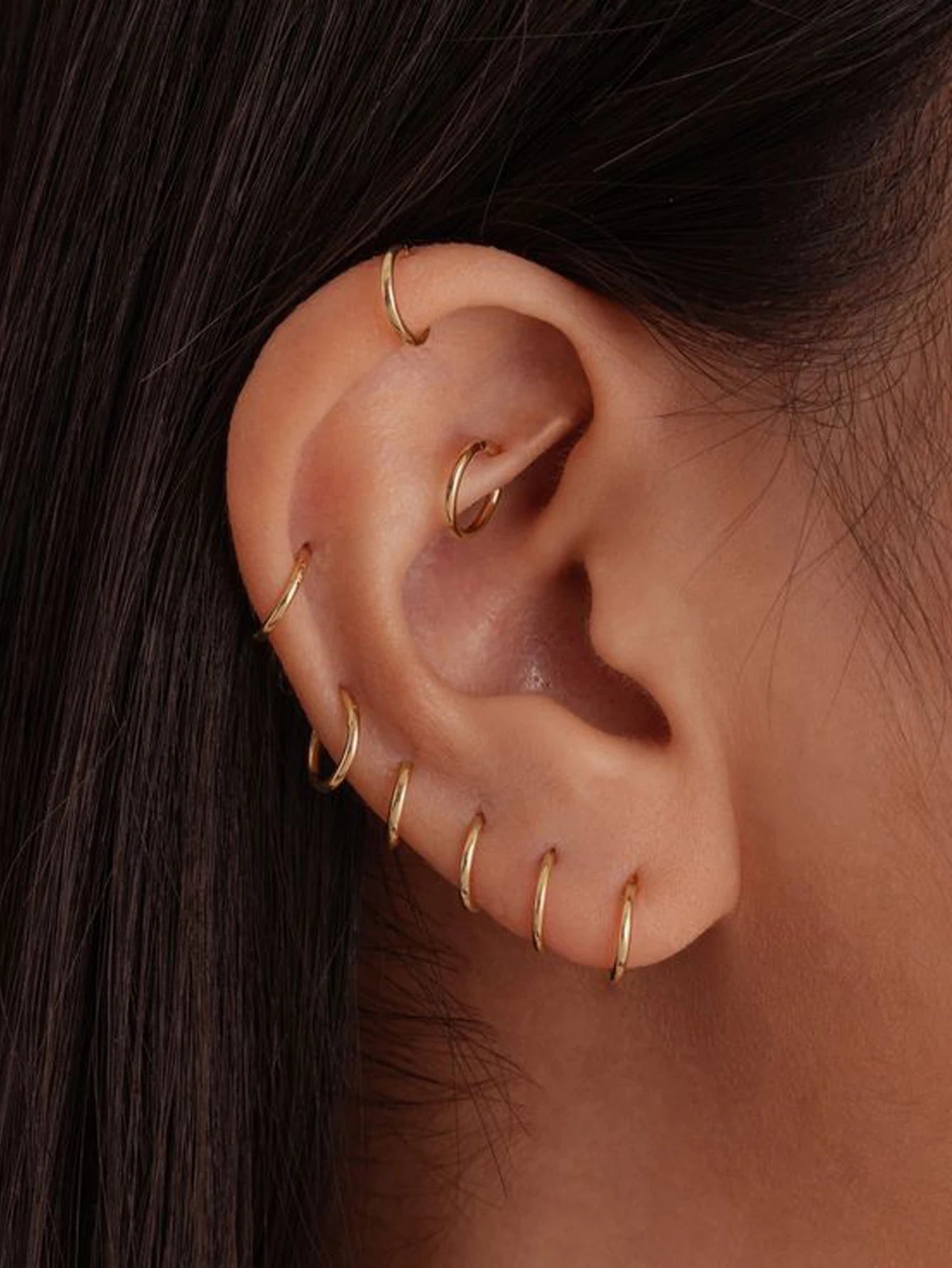 Five Pair Stainless Steel Huggie Hoop Earrings in Gold Tone - Image 1