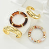 Four-Piece Brown Resin Bangle Set in Gold-Tone - Image 5