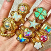 Net red wind series Love butterfly flower Aobao rainbow stone ring copper plated - Image 1